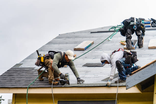 Professional Gutter Installation technician working in Taftville, CT